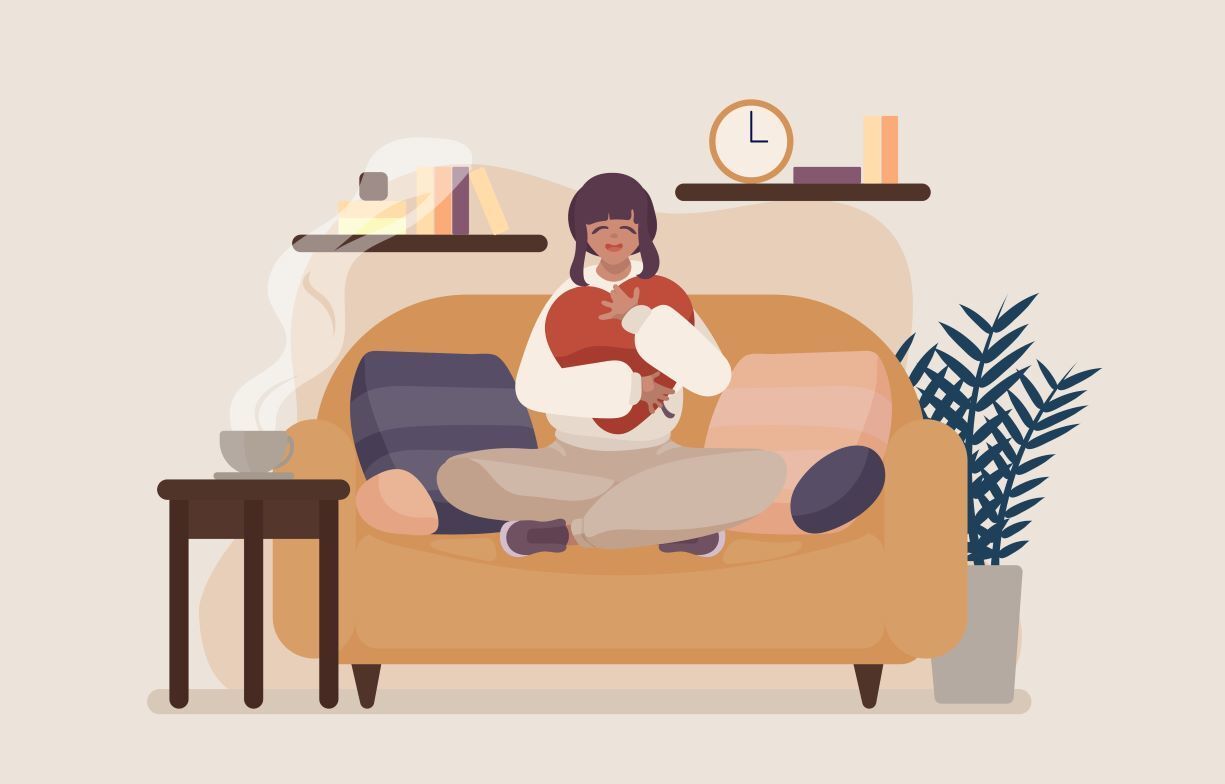 Highly Sensitive Person sitting peacefully on a couch, symbolizing the gifts of sensitivity, inner reflection, and emotional depth